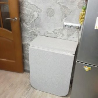 Вузькі кухонні столи (34 фото): вибір довгих обідніх столів на кухню шириною 40-50 см